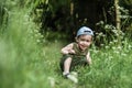 summer time hot day, child in forest Royalty Free Stock Photo