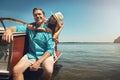 Summer, a time for love and romance. a young couple spending time together on a yacht. Royalty Free Stock Photo