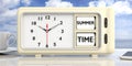 Summer time text on retro alarm clock, blue sky background. 3d illustration. Royalty Free Stock Photo
