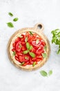 Summer tomato tart with soft cheese and basil