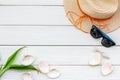 Summer Travaling To The Sea With Straw Hat, Sun Glasses, Shells On White Wooden Background Top View Mock Up