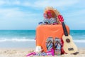 Summer traveling with old suitcase and Fashion woman swimsuit Bikini,starfish, sun glasses, hat. Travel in the holiday, Royalty Free Stock Photo