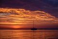 Summer traveling yachting. Boat on water at sunset. Sailboats on ocean sea water. Royalty Free Stock Photo