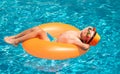Summer travelling. Kids swim with float ring on summer vacation holidays.