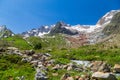 Summer trekking day in the mountains of Val Veny, Courmayeur