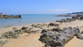 Summer On The Tropical Beach Of Tanjung Kalian With A Stretch Of Rocks