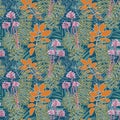 Summer tropical jungle seamless floral pattern on dark blue background. Various colorful leaves and plants with flowers Royalty Free Stock Photo