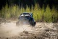 Summer UTV, ATV & offroad driving in dust. Quad racing Royalty Free Stock Photo