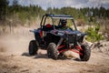 Summer UTV, ATV & offroad driving in dust. Quad racing Royalty Free Stock Photo