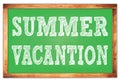 SUMMER VACANTION words on green wooden frame school blackboard