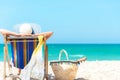 Summer Vacation. Asian lifestyle healthy woman relaxing and happy on beach chair with cocktail coconut juice in holiday summer. C