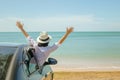 Family car trip at the sea, Asian woman feeling happiness. Royalty Free Stock Photo