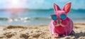 Summer vacation concept. A cool looking rabbit enjoying sun on the beach wearing sunglasses Royalty Free Stock Photo