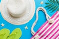 Summer vacation concept flat lay. beach accessories and towel top view. Space for text. travel concept Royalty Free Stock Photo