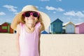 Ashamed little girl standing on the beach Royalty Free Stock Photo