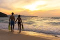 Summer Vacation. Couple walking holding hands on tropical on the beach sunset time in holiday after snorkel swim. Honeymoon holid Royalty Free Stock Photo