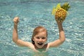 Summer vacation. Cute kid in swimming pool. Children play in tropical resort. Family beach vacation and summer activity. Royalty Free Stock Photo