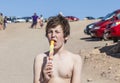 Summer vacation: cute teen eating Royalty Free Stock Photo