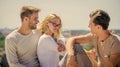 Summer vacation. Discussing ideas. Friends relaxing on roof. Carefree friends. True friendship. Being sincere with Royalty Free Stock Photo