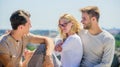 Summer vacation. Discussing ideas. Friends relaxing on roof. Carefree friends. True friendship. Being sincere with Royalty Free Stock Photo