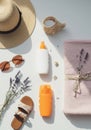 Summer Vacation Essentials Flatlay: Suncare Products, Accessories and Lavender Royalty Free Stock Photo