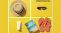 Summer vacation essentials on yellow background Royalty Free Stock Photo