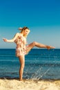 Summer vacation. Girl having fun on the sea coast Royalty Free Stock Photo