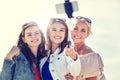 Group of smiling women taking selfie on beach Royalty Free Stock Photo