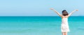 Summer Vacation. Lifestyle woman raise arm and hand on wave relax and happy on beach tropical outdoor