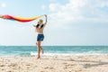 Summer Vacation. Lifestyle woman walking and jumping relax happy on beach tropical outdoor in summer day.