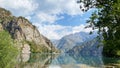 Summer vacation in the mountains of Kyrgyzstan on the shore of the amazing lake Sary Chelek. The State Biosphere Reserve is a Royalty Free Stock Photo