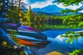 Summer Vacation In The Mountains Lake Side Canoes Royalty Free Stock Photo