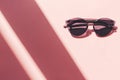 Summer vacation and party concept. stylish black sunglasses on t