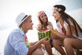 Summer, vacation, party, people concept. Group of friends having fun and party on the beach. Royalty Free Stock Photo