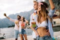 Summer, vacation, party, people concept. Group of friends having fun and party on the beach. Royalty Free Stock Photo