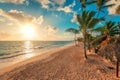 Summer vacation in Punta Cana. Beautiful sunrise over tropical island beach. Royalty Free Stock Photo