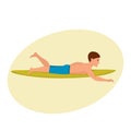 Man swims on surfboard, rowing his hands, lying on stomach.