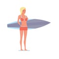 Surfer stands sideways holding board for swimming in his hands. Royalty Free Stock Photo