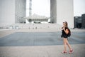 Summer vacation. Sightseeing guide. Girl tourist sunglasses enjoy city center square. Woman stand in front of urban Royalty Free Stock Photo