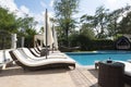 Summer vacation. Swimming pool of luxury hotel with umbrella and chair around. Hotel resort in Bulgaria, Primorsko for travel Royalty Free Stock Photo