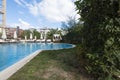 Summer vacation. Swimming pool of luxury hotel with umbrella and chair around. Hotel resort in Bulgaria, Primorsko for travel Royalty Free Stock Photo