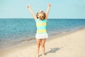 Summer vacation, travel concept - little girl child having fun on beach Royalty Free Stock Photo