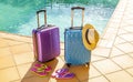 Suitcases, sandals and panama hat at the pool Royalty Free Stock Photo