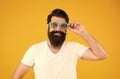 Summer vacation. Ultraviolet protection concept. Man eyewear model. Handsome guy wear sunglasses. Hipster bearded man in Royalty Free Stock Photo