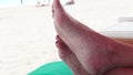 Summer vacation - woman dancing feet with sand on it. Tropical island Bali, Indonesia.