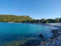 Summer vacations - blue Mediterranean sea and Moonlight park sand beach resort of Turkey Kemer Royalty Free Stock Photo