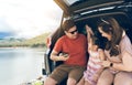 Summer vacations.Happy family enjoying trip with their favorite car. Holiday and travel family concept Royalty Free Stock Photo