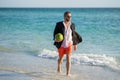 Summer vacations and travel concept. business man on the beach. Businessman with watermelon. Summer business vacation
