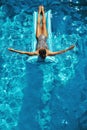 Summer Vacations. Woman Sunbathing, Floating In Swimming Pool Water Royalty Free Stock Photo