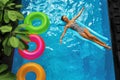 Summer Vacations. Woman Sunbathing, Floating In Swimming Pool Water Royalty Free Stock Photo